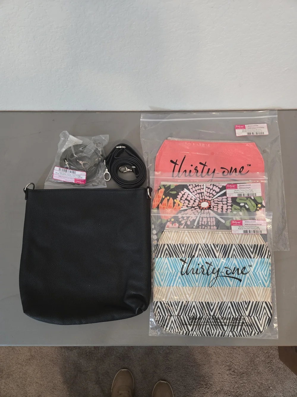 Thirty-One Black Crossbody Bag with Assorted Coral and Patterned Pouches